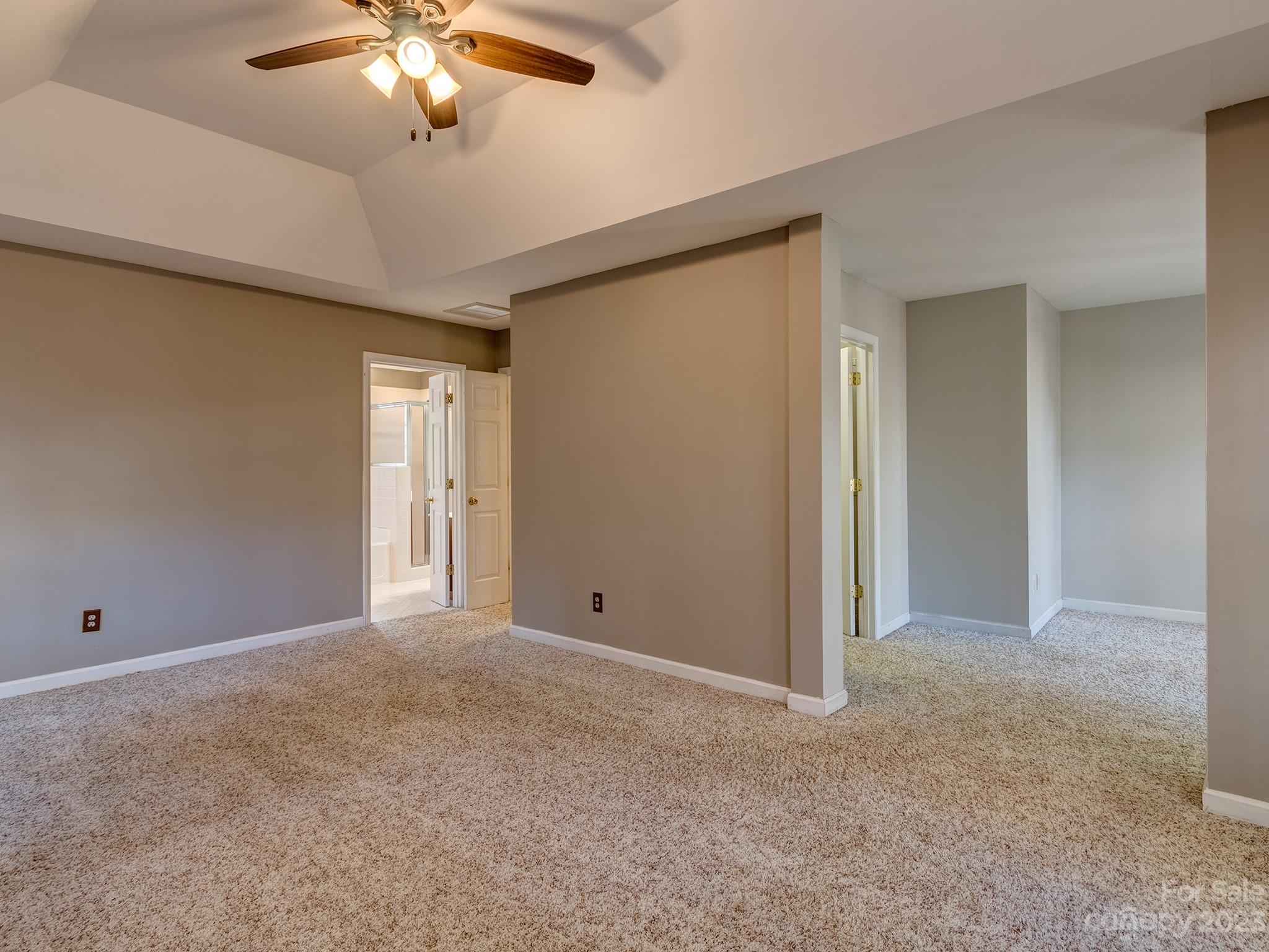 3301 Carnegie Lane Mint Hill, NC 28105 - Photo 19 of 34 an empty room with chandelier fan