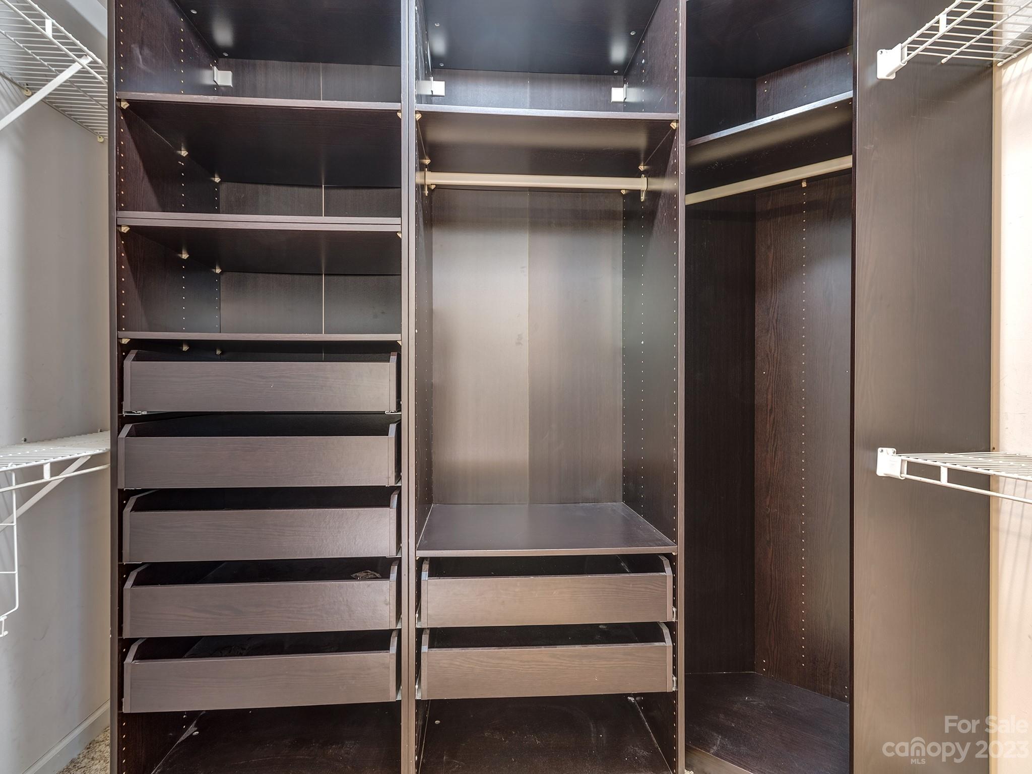 3301 Carnegie Lane Mint Hill, NC 28105 - Photo 23 of 34 a view of walk in closet with empty racks