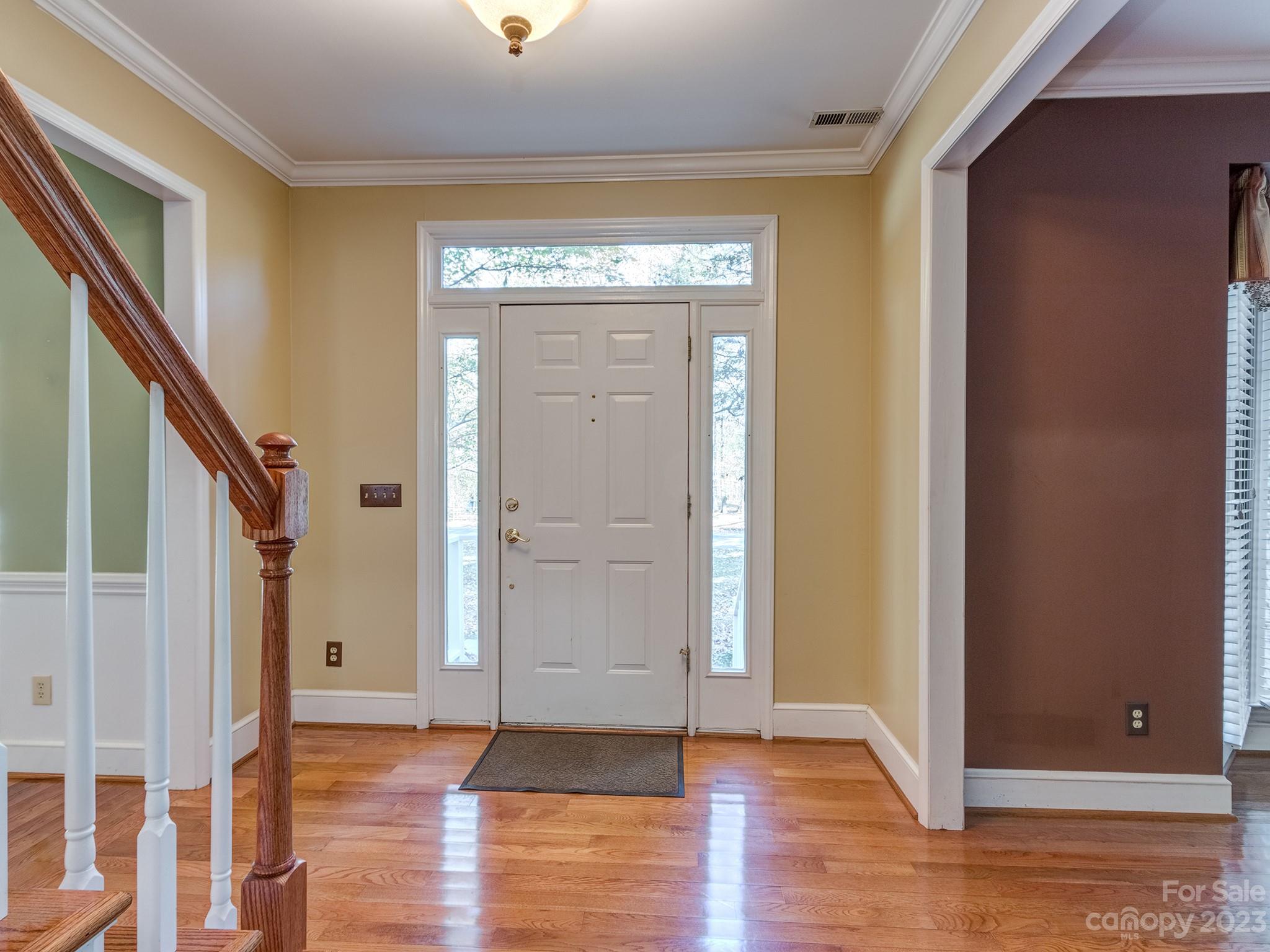 3301 Carnegie Lane Mint Hill, NC 28105 - Photo 10 of 34 a view of an entryway with wooden floor