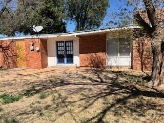 2413 46th Street Lubbock, TX 79412 - Photo 16 of 18 a view of a house with a yard
