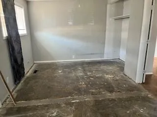 a bathroom with a bathtub and a sink