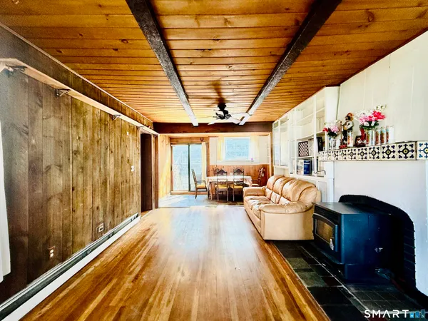 a view of a couch in wooden deck