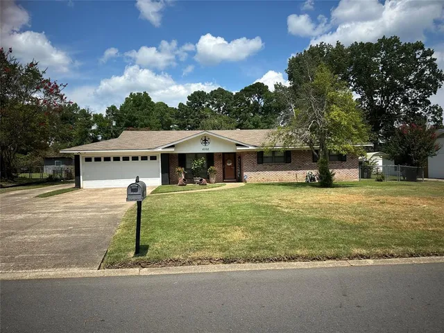 front view of a house with a patio