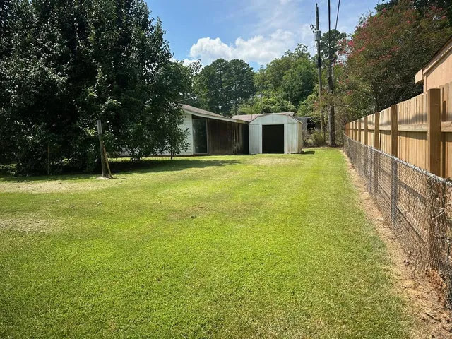 a view of a garden with a outdoor space