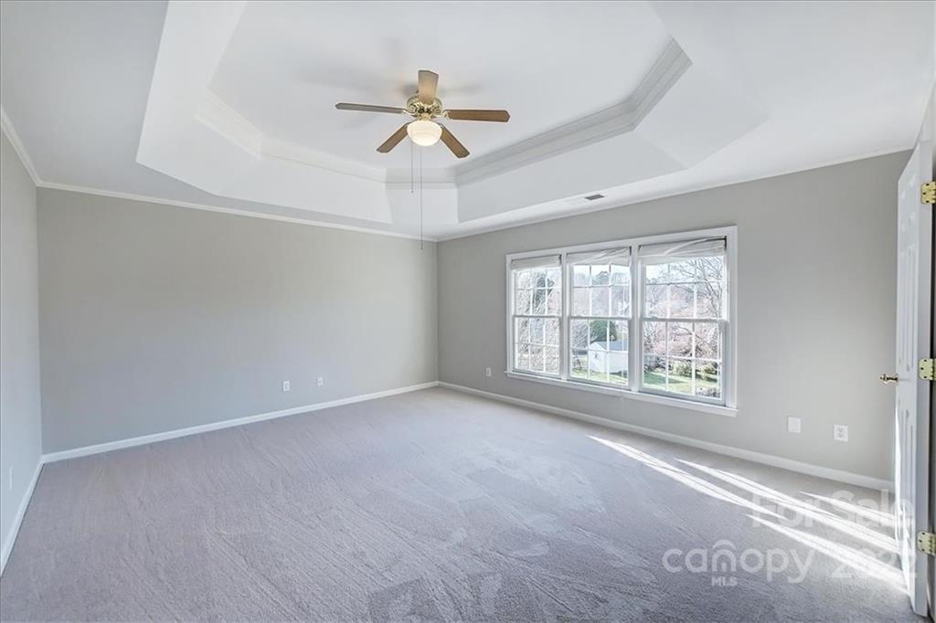 10409 Friarsgate Road Huntersville, NC 28078 - Photo 14 of 30 a view of an empty room with a window