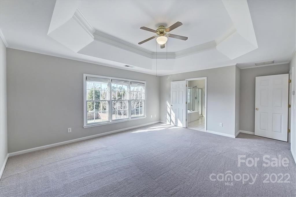 10409 Friarsgate Road Huntersville, NC 28078 - Photo 15 of 30 a view of an empty room with a window