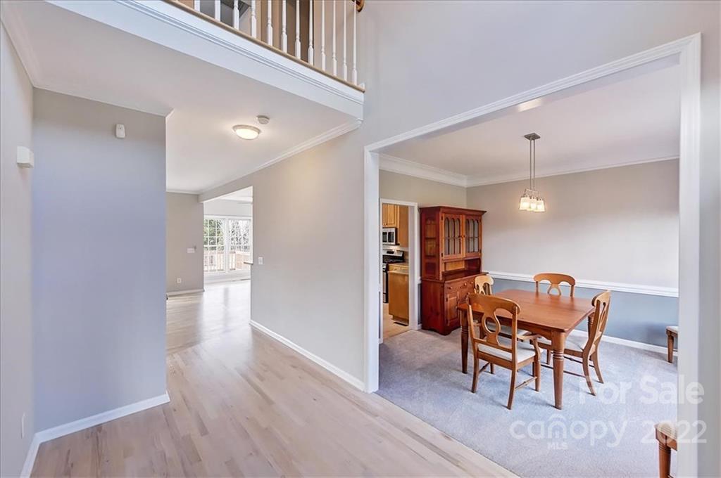 10409 Friarsgate Road Huntersville, NC 28078 - Photo 2 of 30 a view of a dining room with furniture and window