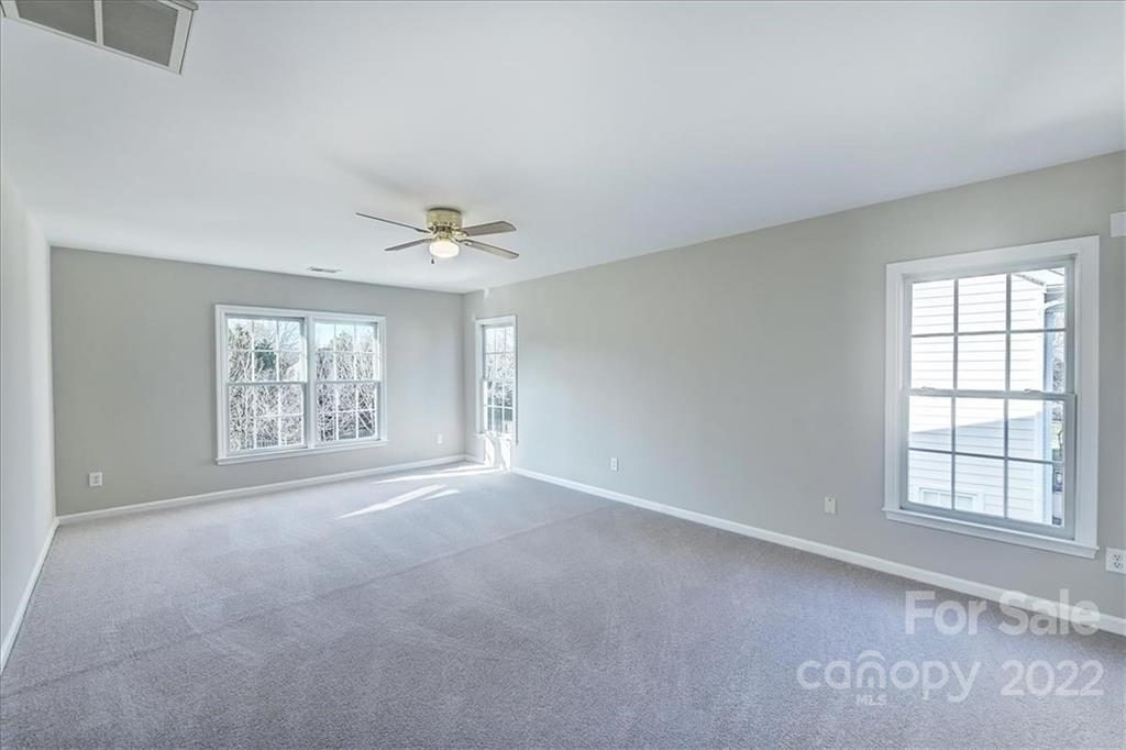 10409 Friarsgate Road Huntersville, NC 28078 - Photo 24 of 30 a view of an empty room with a window