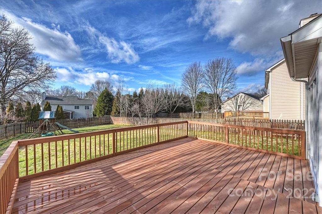 10409 Friarsgate Road Huntersville, NC 28078 - Photo 27 of 30 a view of a balcony with wooden floor