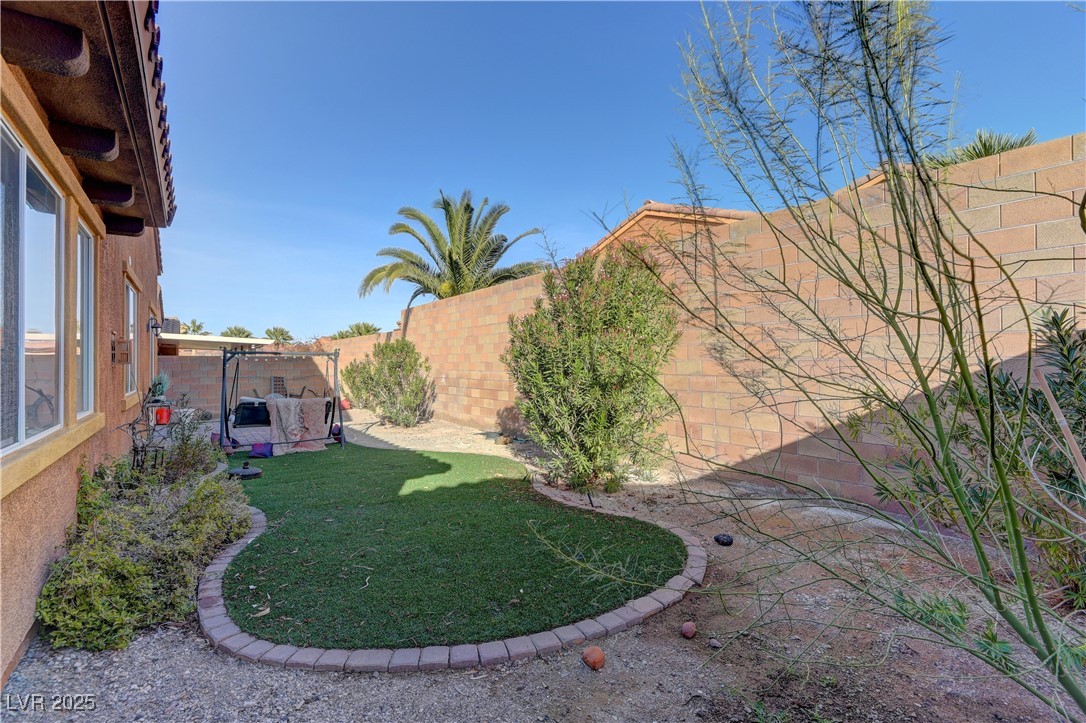 972 Rue Grand Paradis Lane Henderson, NV 89011 - Photo 27 of 32 Fenced backyard with a patio