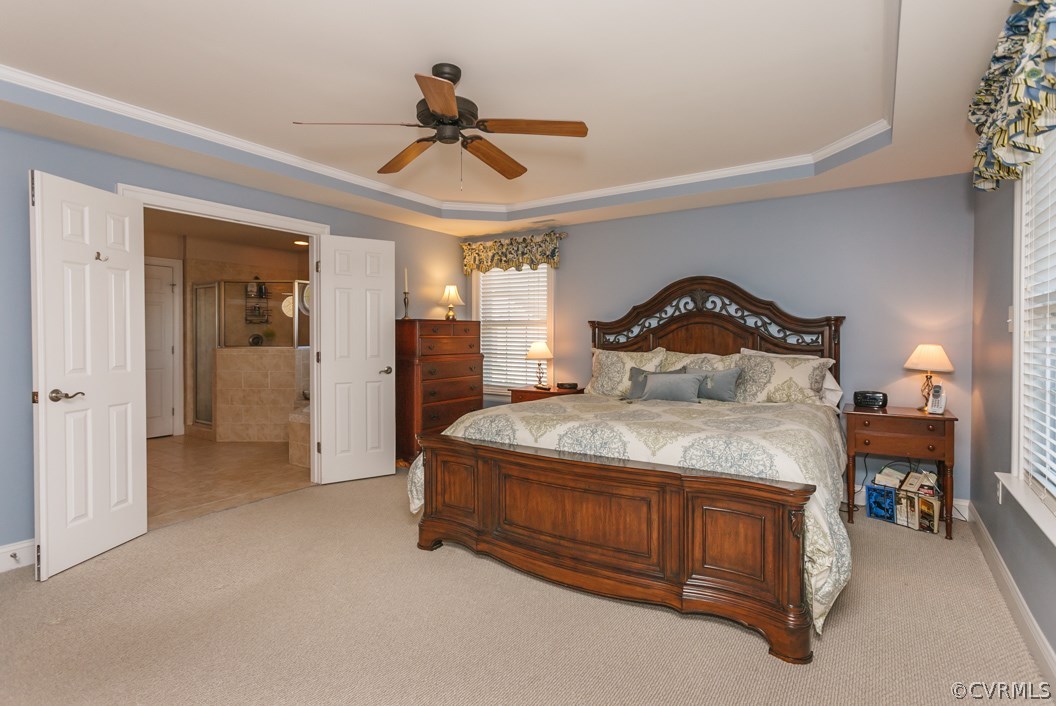 14113 Rigney Drive Midlothian, VA 23113 - Photo 14 of 24 a bedroom with a bed and a chandelier
