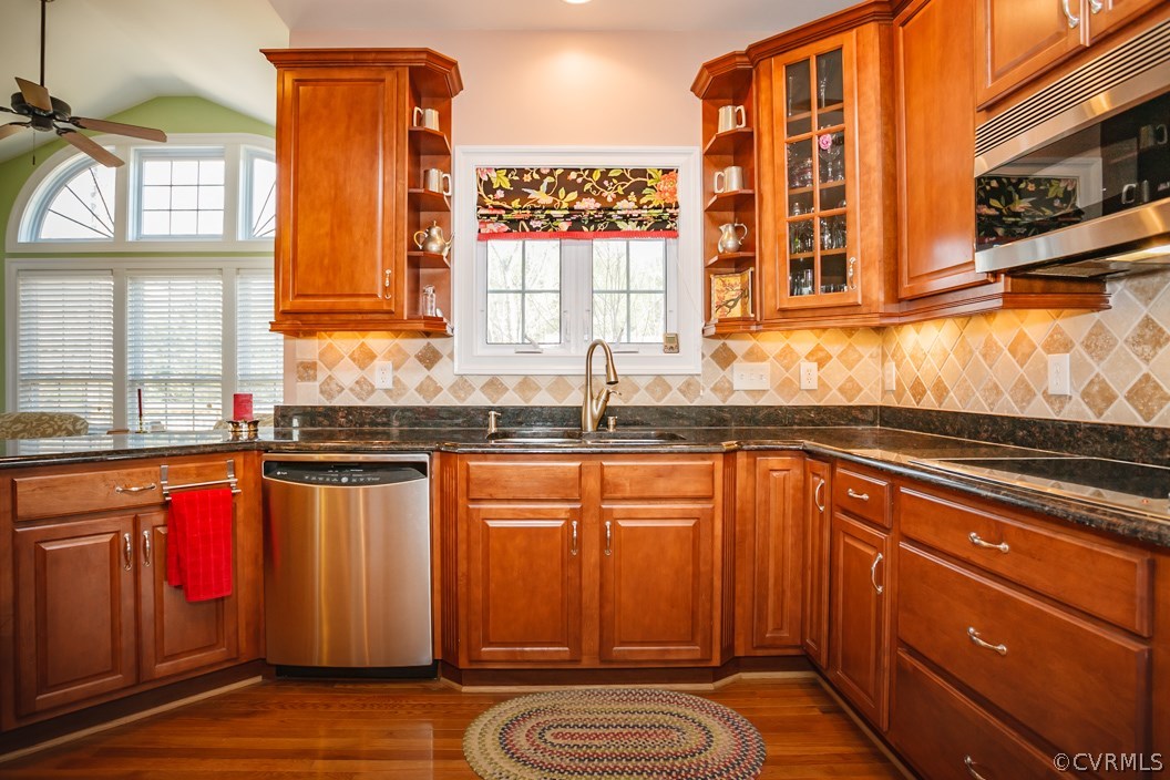 14113 Rigney Drive Midlothian, VA 23113 - Photo 8 of 24 a kitchen with stainless steel appliances granite countertop a sink stove and cabinets