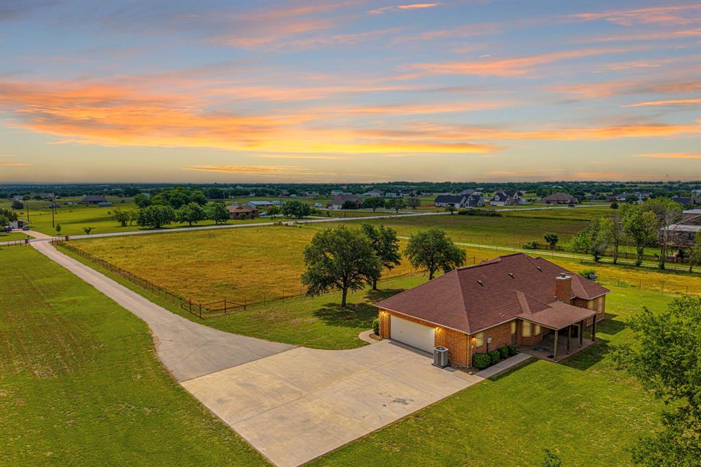 483 Christy Kay Lane Rhome, TX 76078 - Photo 2 of 40 a view of a lake with a garden