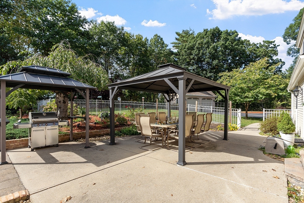18 Bramley Hill Road Windham, NH 03087 - Photo 11 of 42 a view of outdoor space yard deck patio and outdoor seating