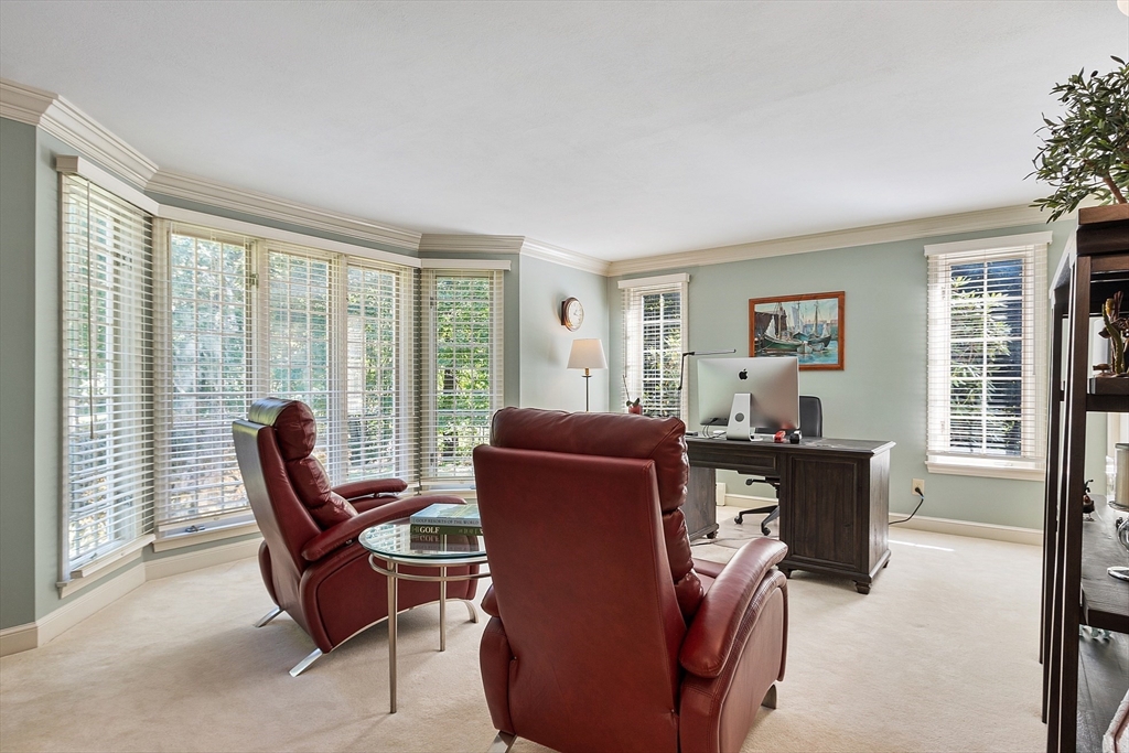 18 Bramley Hill Road Windham, NH 03087 - Photo 17 of 42 a living room with furniture and large windows