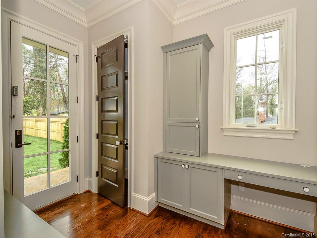 526 Ashworth Road Charlotte, NC 28211 - Photo 7 of 15 a view of an entryway with wooden floor and a window