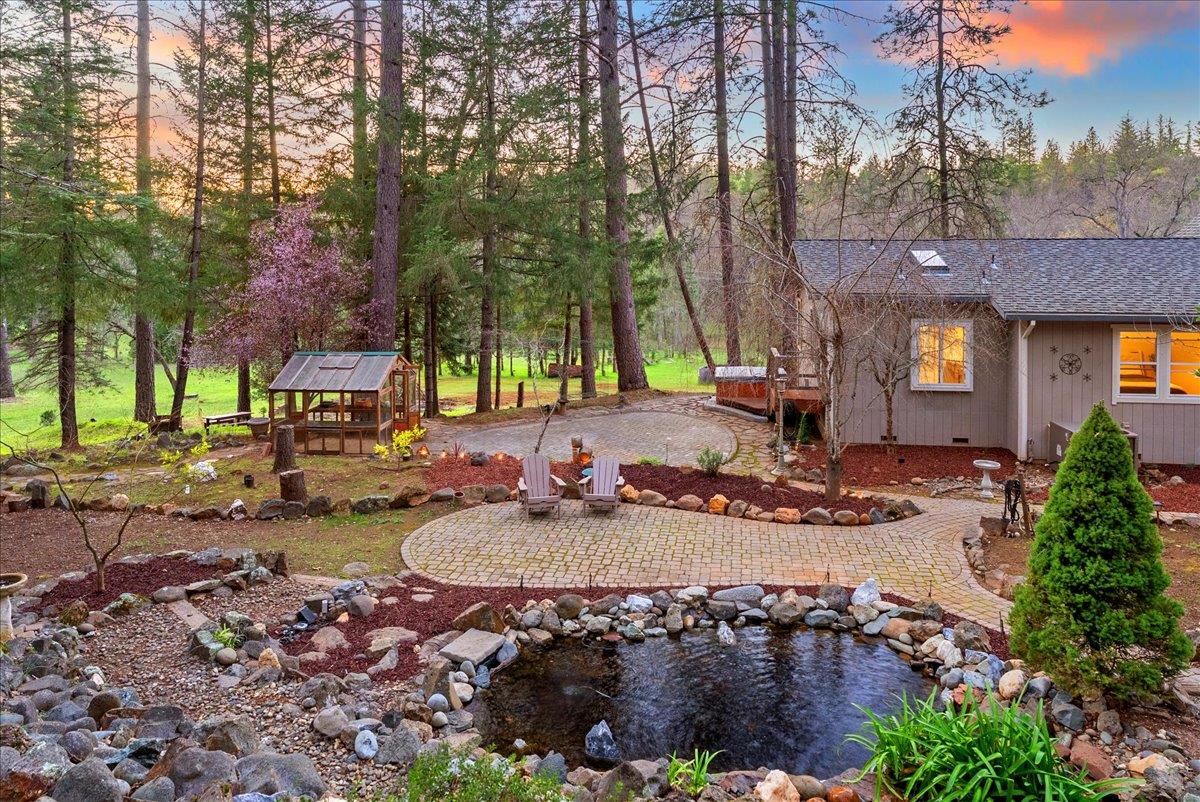 5621 Saw Mill Road Placerville, CA 95667 - Photo 11 of 75 a view of a house with backyard