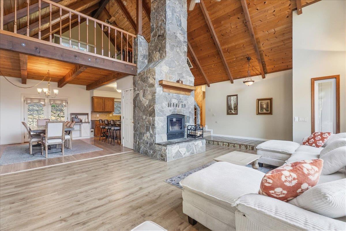 5621 Saw Mill Road Placerville, CA 95667 - Photo 13 of 75 a living room with furniture and a wooden floor
