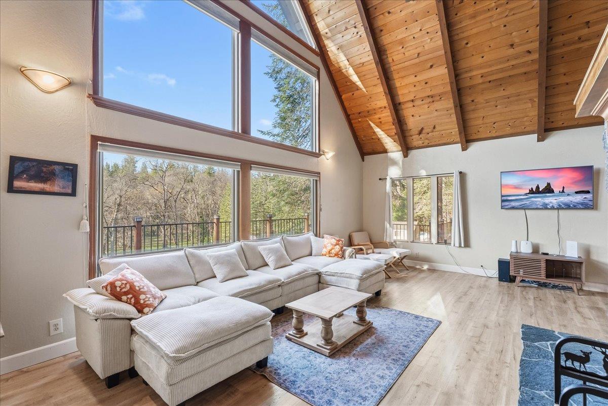 5621 Saw Mill Road Placerville, CA 95667 - Photo 14 of 75 a living room with furniture and a large window