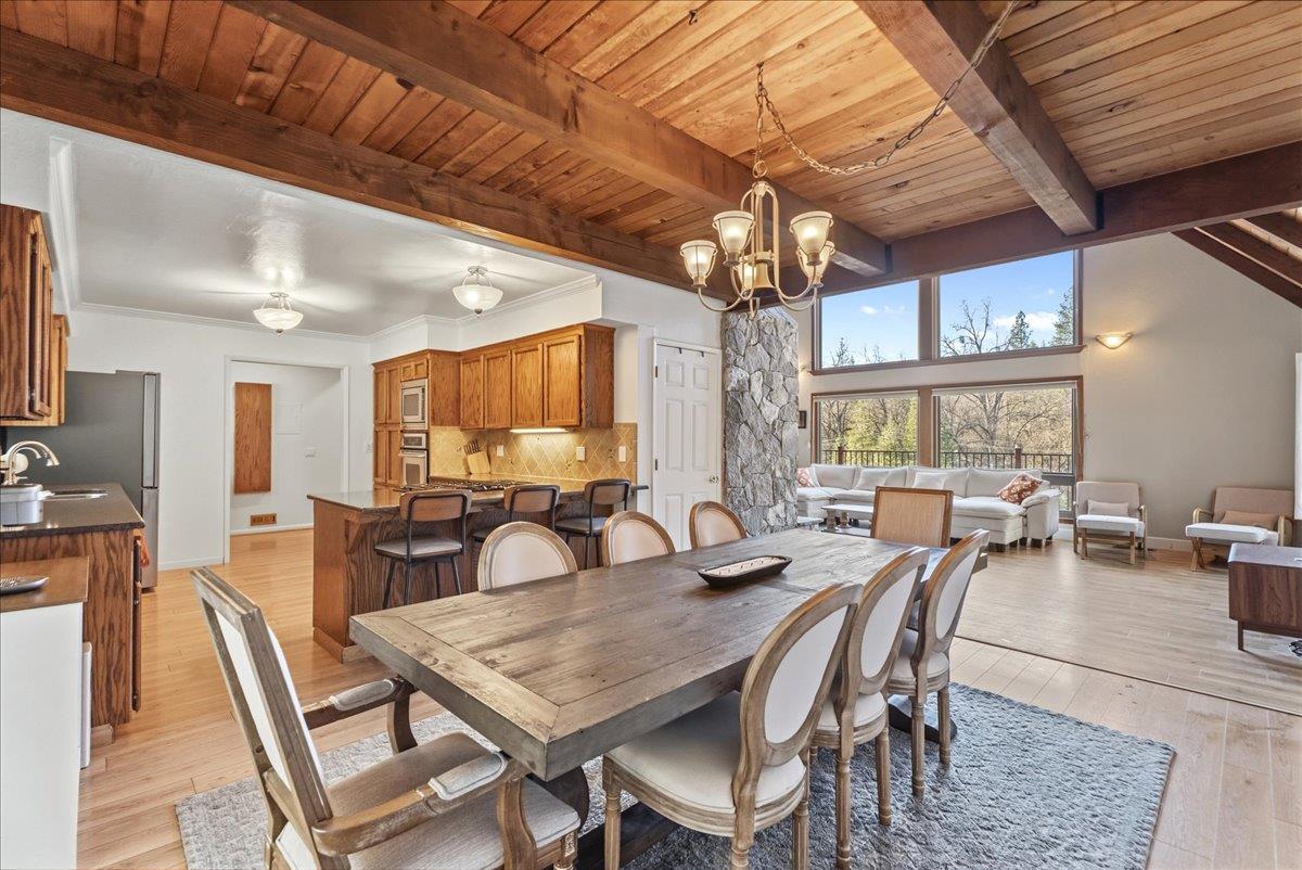 5621 Saw Mill Road Placerville, CA 95667 - Photo 17 of 75 a view of a dining room with furniture window and outside view