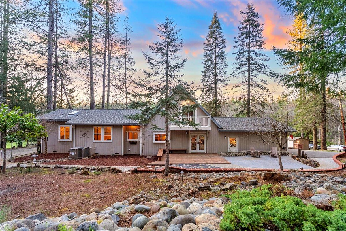 5621 Saw Mill Road Placerville, CA 95667 - Photo 3 of 75 a backyard of a house with yard and outdoor seating