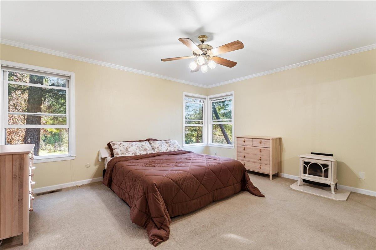 5621 Saw Mill Road Placerville, CA 95667 - Photo 31 of 75 a bedroom with a bed and a window