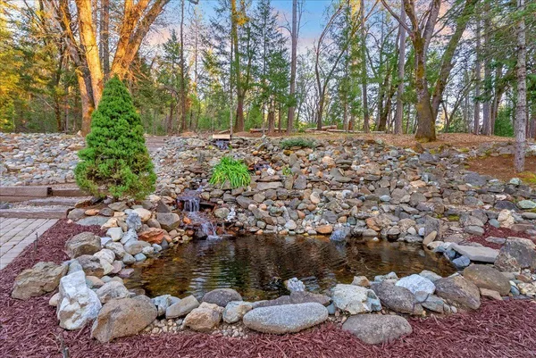 a backyard of a house with lots of green space