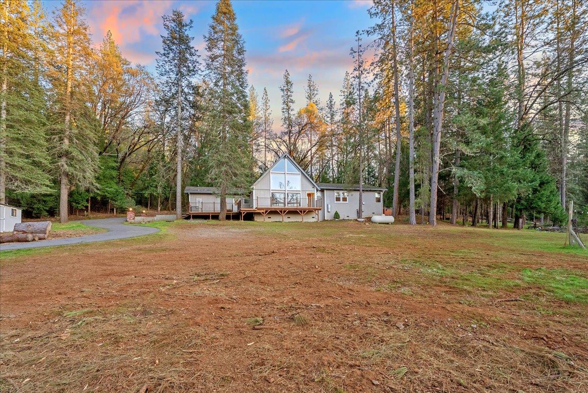 5621 Saw Mill Road Placerville, CA 95667 - Photo 57 of 75 a view of a house with backyard and trees