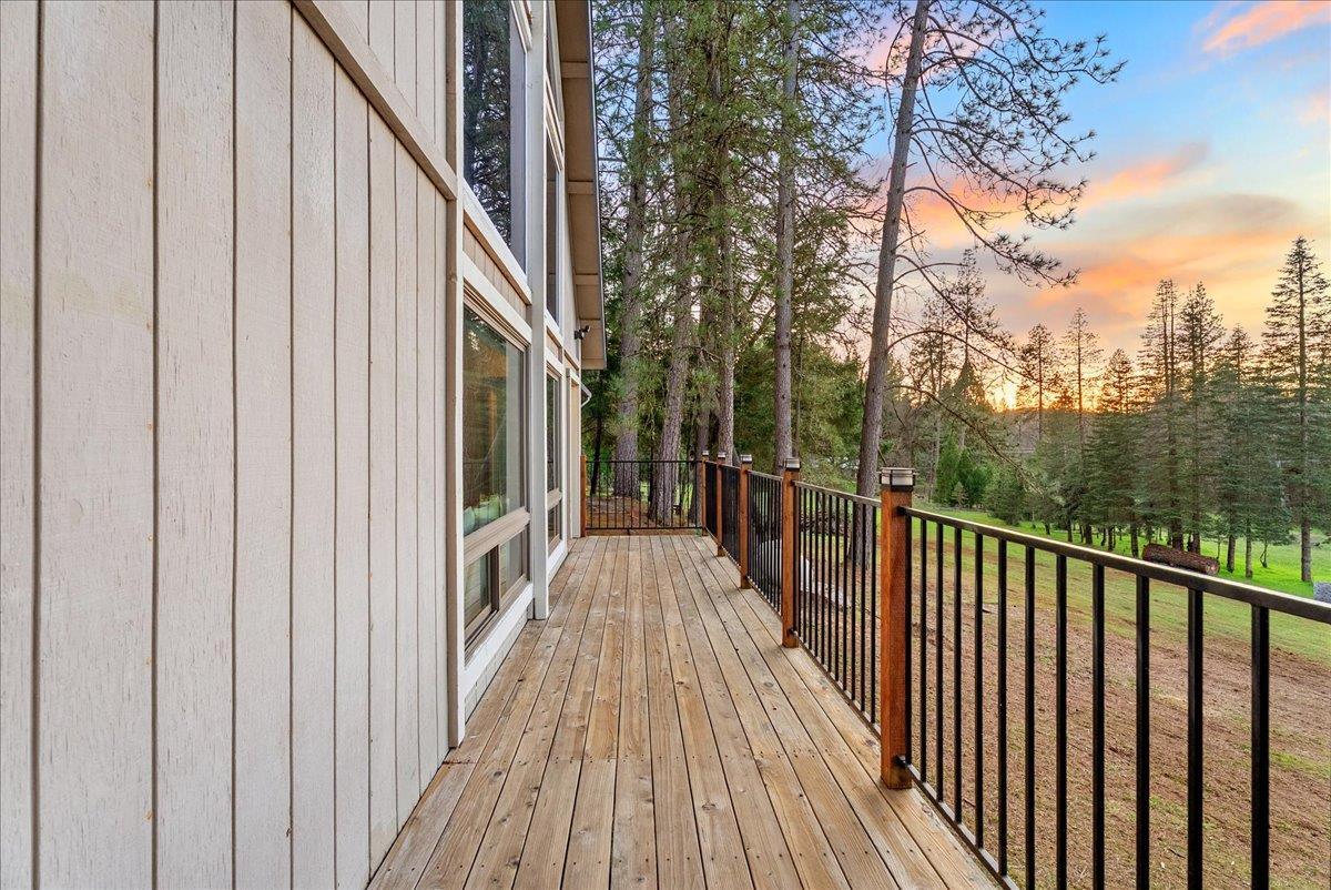 5621 Saw Mill Road Placerville, CA 95667 - Photo 64 of 75 a view of balcony with wooden floor and fence