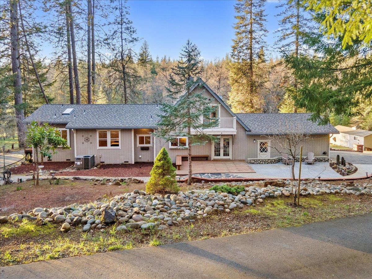 5621 Saw Mill Road Placerville, CA 95667 - Photo 66 of 75 a front view of a house with a yard