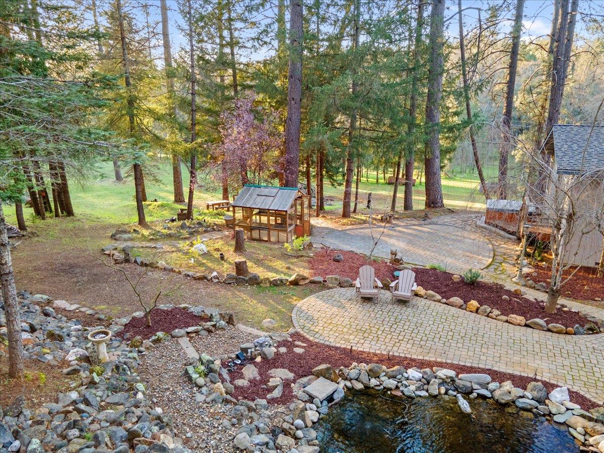 5621 Saw Mill Road Placerville, CA 95667 - Photo 67 of 75 a view of a backyard with large trees