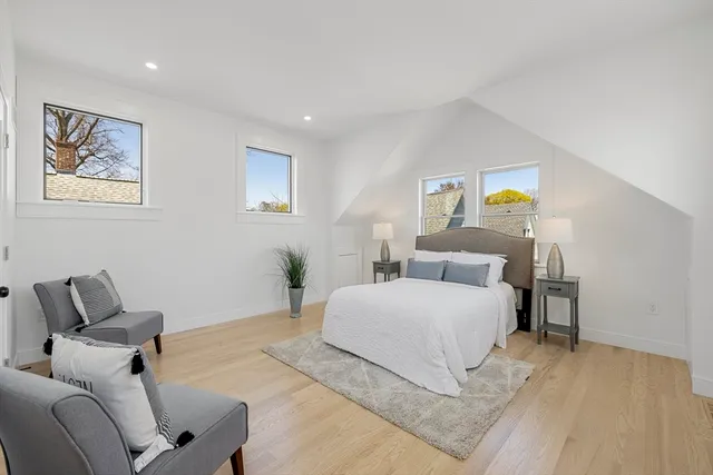 a bedroom with a bed and furniture