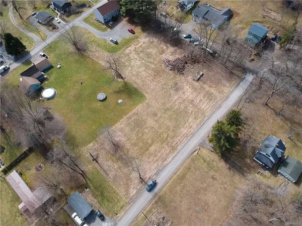 an aerial view of residential house with outdoor space