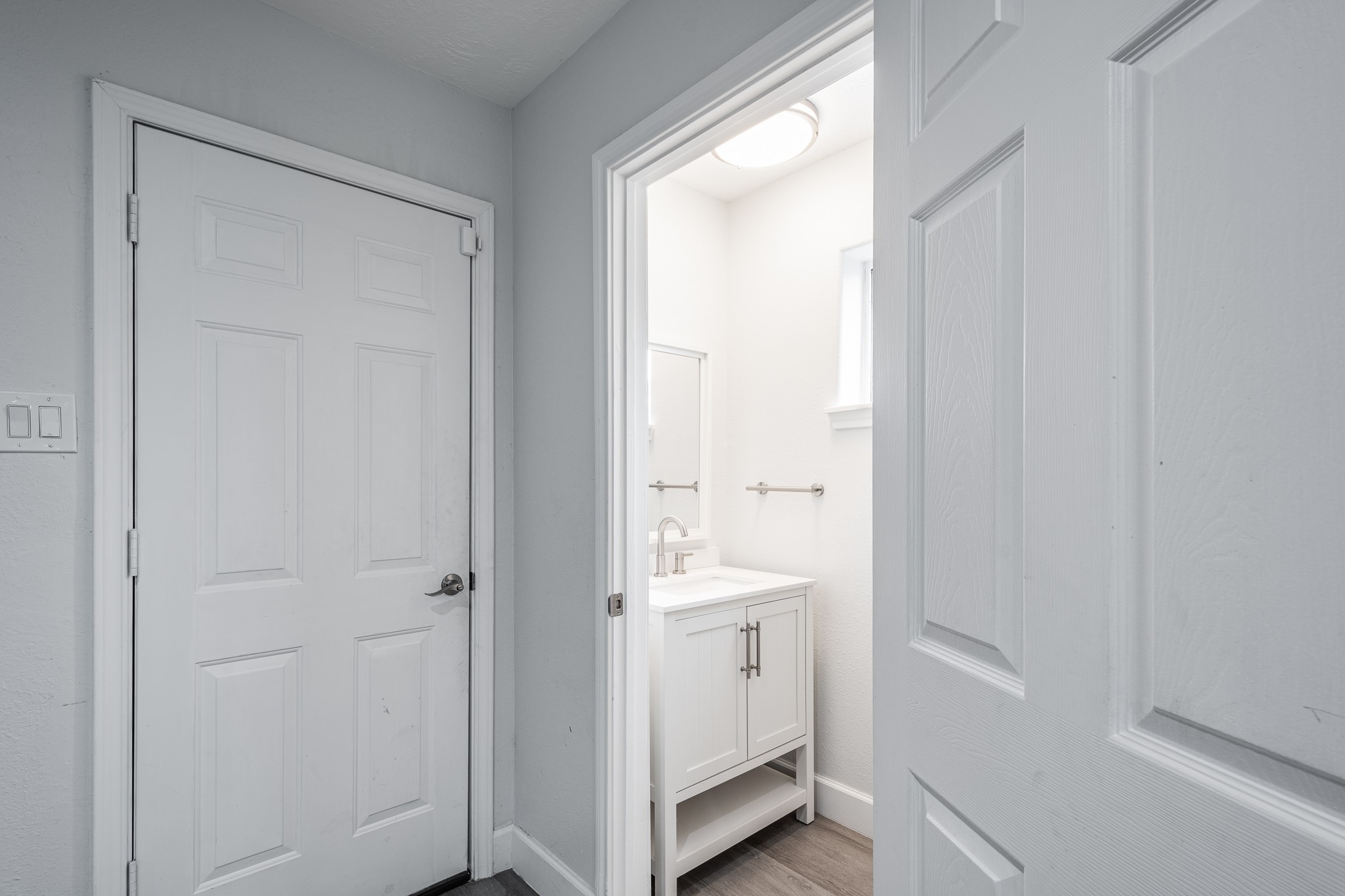 9026 McGallion Road Houston, TX 77022 - Photo 19 of 34 a bathroom with a sink and a mirror