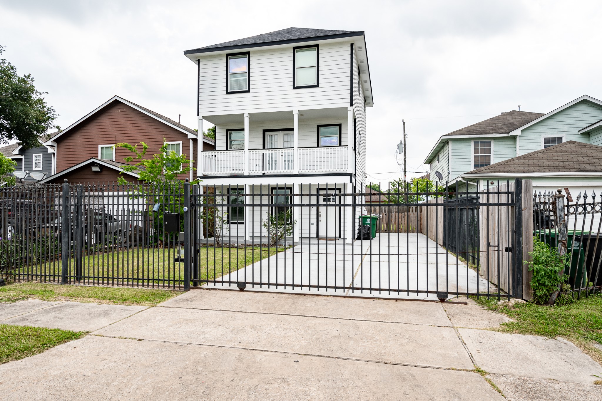 9026 McGallion Road Houston, TX 77022 - Photo 2 of 34 a view of a house with a street view