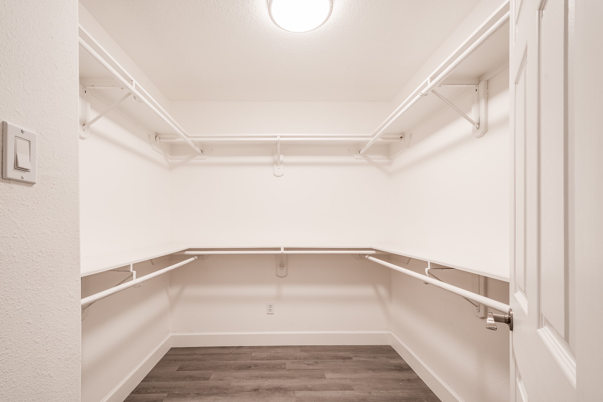 9026 McGallion Road Houston, TX 77022 - Photo 25 of 34 a view of a room with racks on the wall