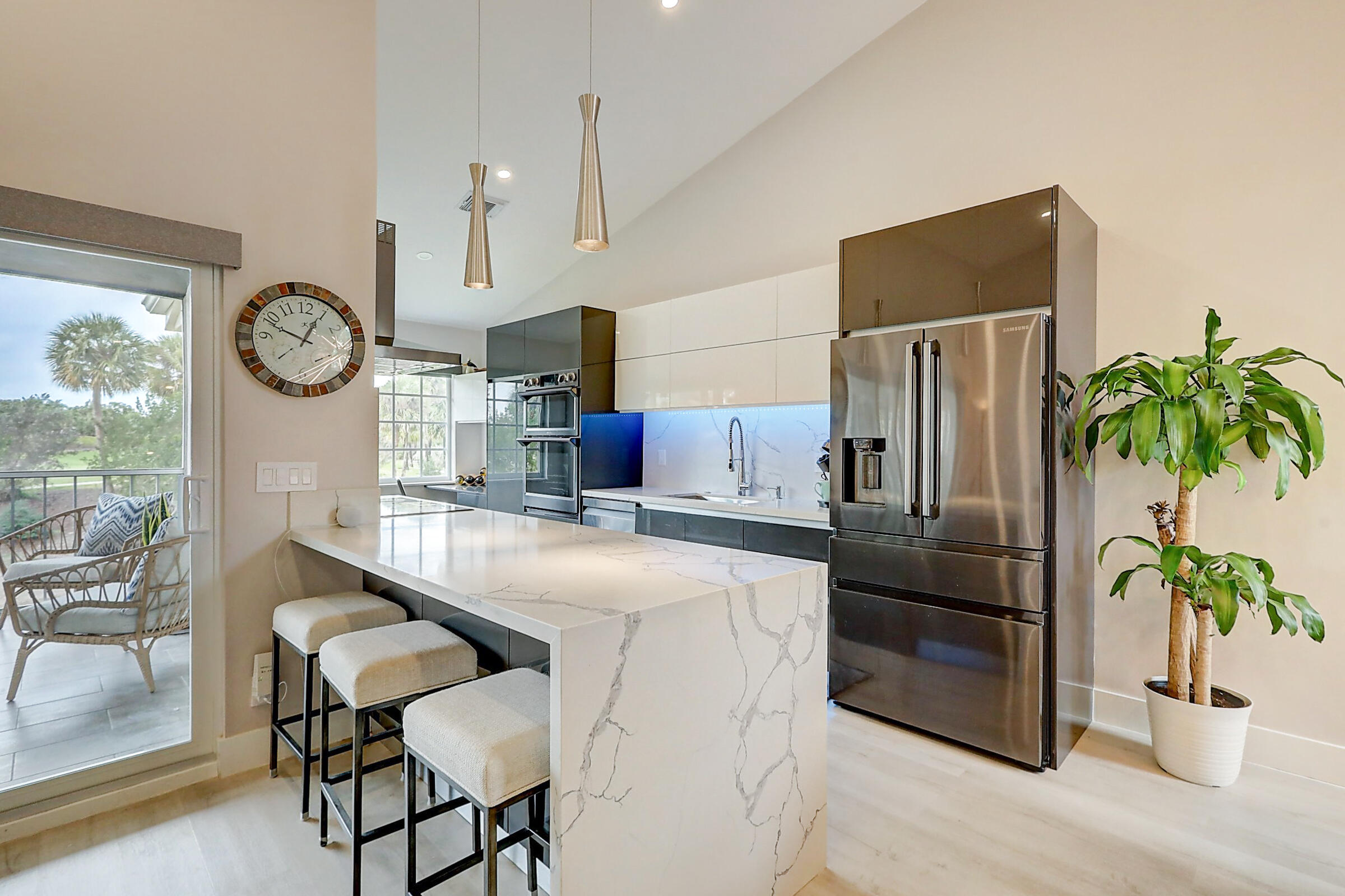 17256 Boca Club Boulevard, Unit 1402 Boca Raton, FL 33487 - Photo 13 of 33 Waterfall Quarts Countertop