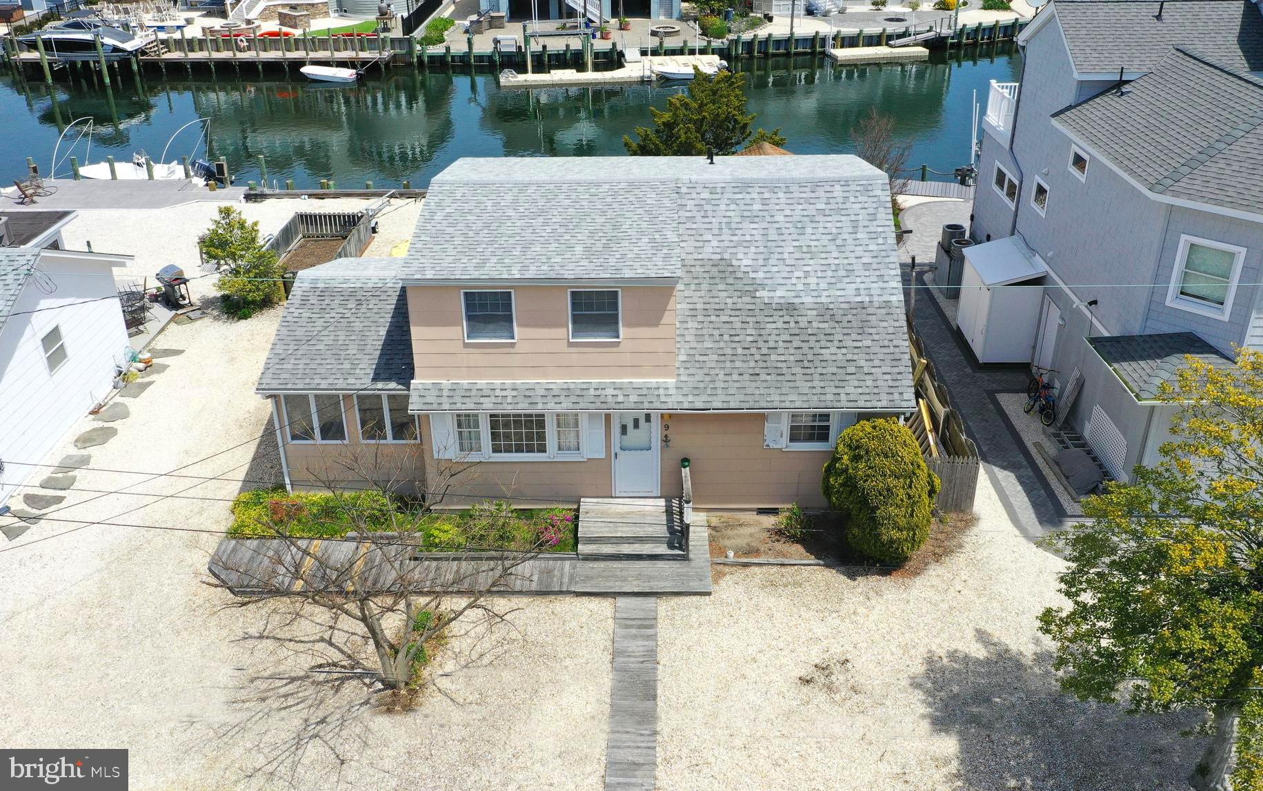 9 Adrian Road Long Beach Township, NJ 08006 - Photo 1 of 45 Front Exterior with view to lagoon