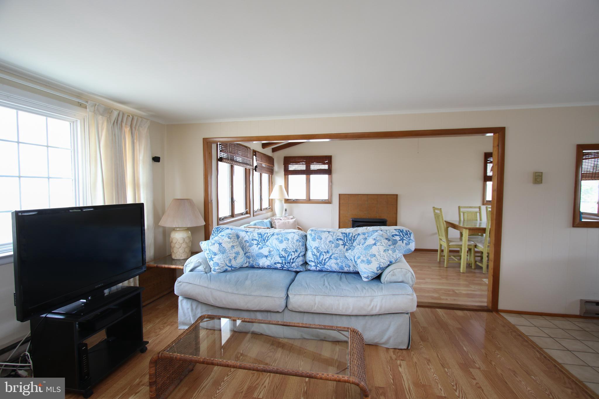 9 Adrian Road Long Beach Township, NJ 08006 - Photo 8 of 45 Living Area with view to sunny sitting room