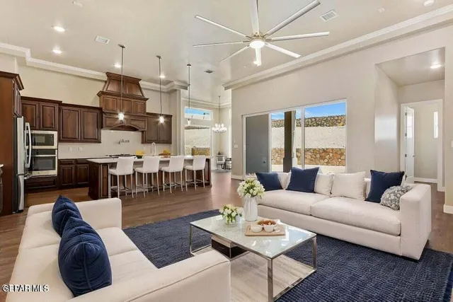 a kitchen with stainless steel appliances granite countertop a stove and a microwave