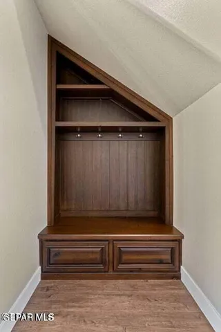 a kitchen with stainless steel appliances granite countertop a stove and a microwave