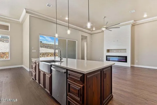 a bedroom with a large bed and a couch