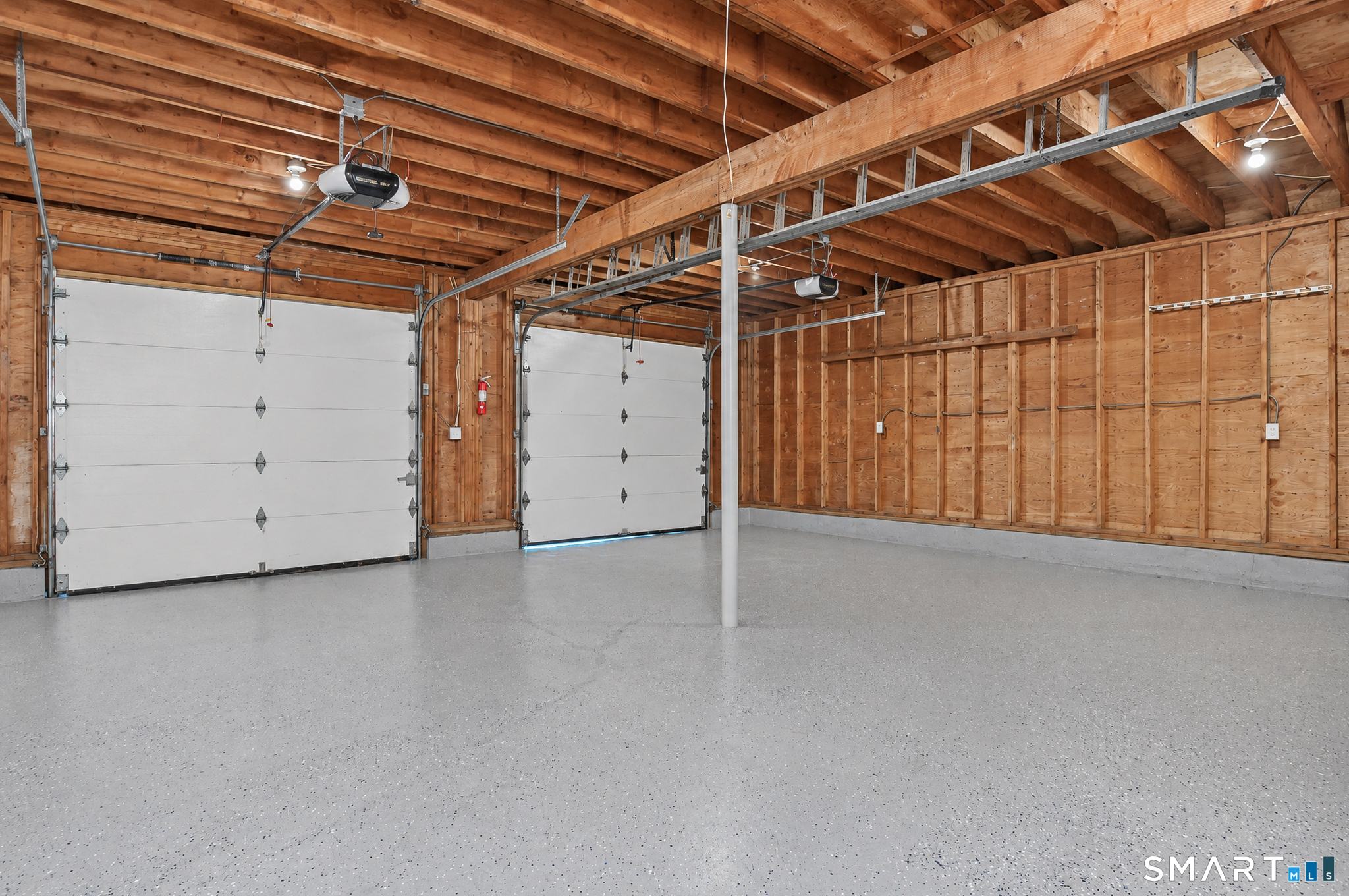 34 Rimmon Road Woodbridge, CT 06525 - Photo 30 of 40 Detached two-car garage with generous space for vehicles and storage.