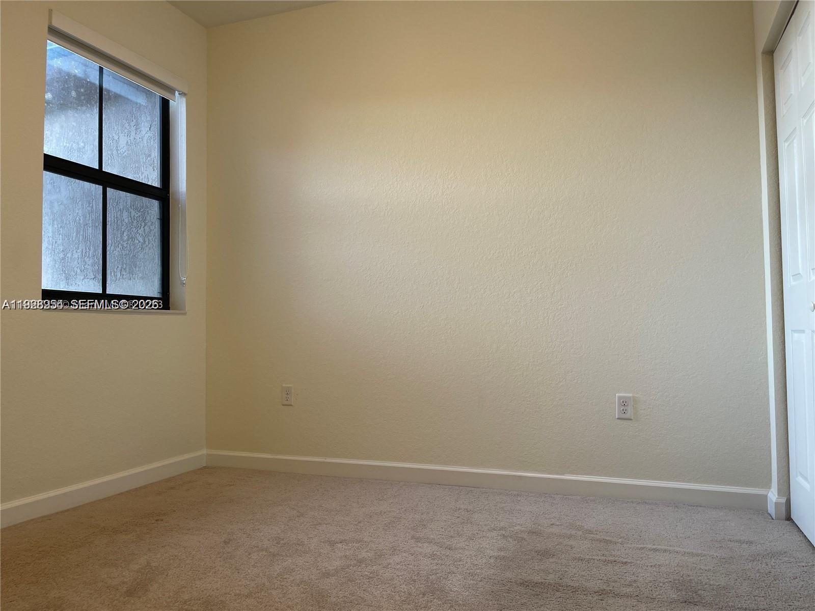 10491 West 34th Court Hialeah, FL 33018 - Photo 15 of 37 a view of an empty room