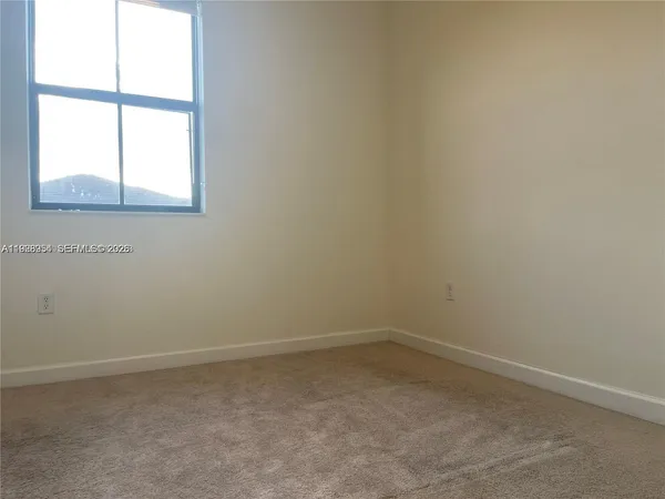 an empty room with a window