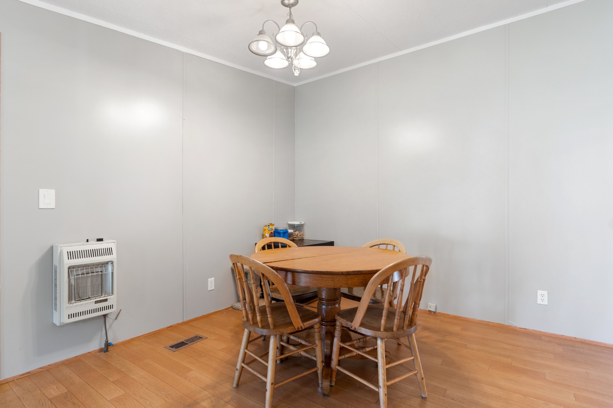 2600 Creecy Hollow Road Pulaski, TN 38478 - Photo 15 of 47 a view of a dining room with furniture and wooden floor