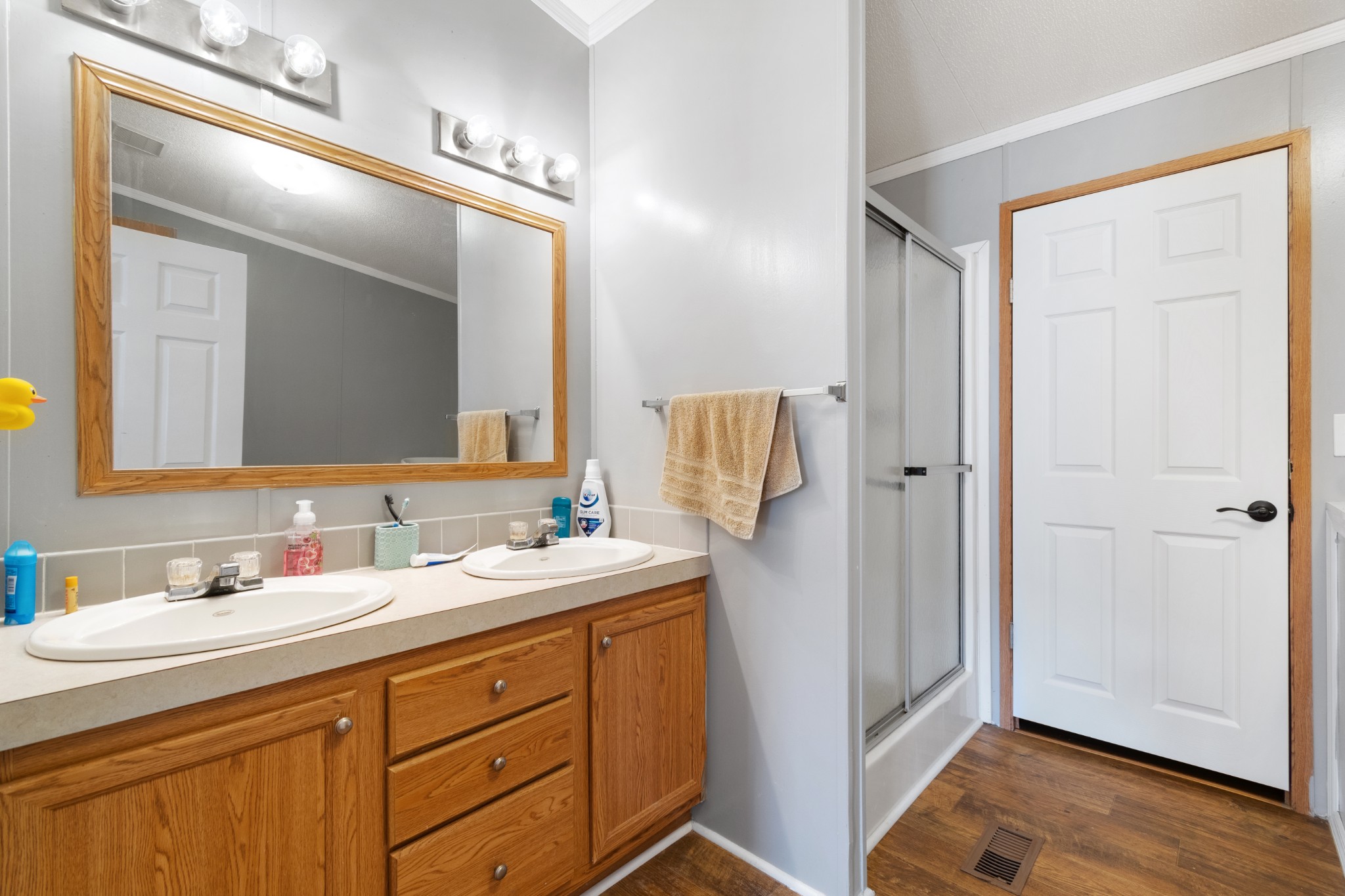 2600 Creecy Hollow Road Pulaski, TN 38478 - Photo 20 of 47 a bathroom with a double vanity sink mirror and