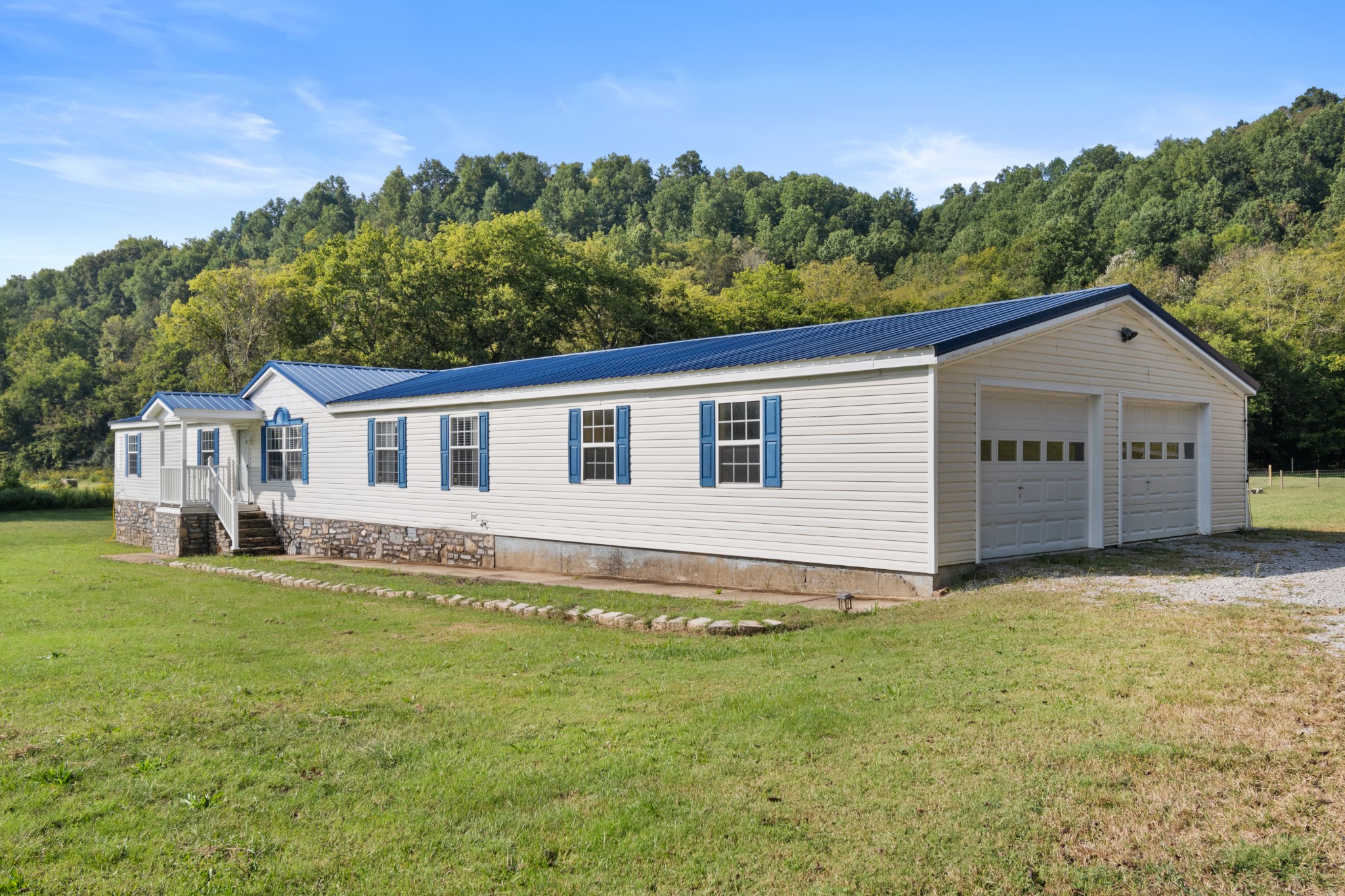 2600 Creecy Hollow Road Pulaski, TN 38478 - Photo 2 of 47 a view of a house with a yard