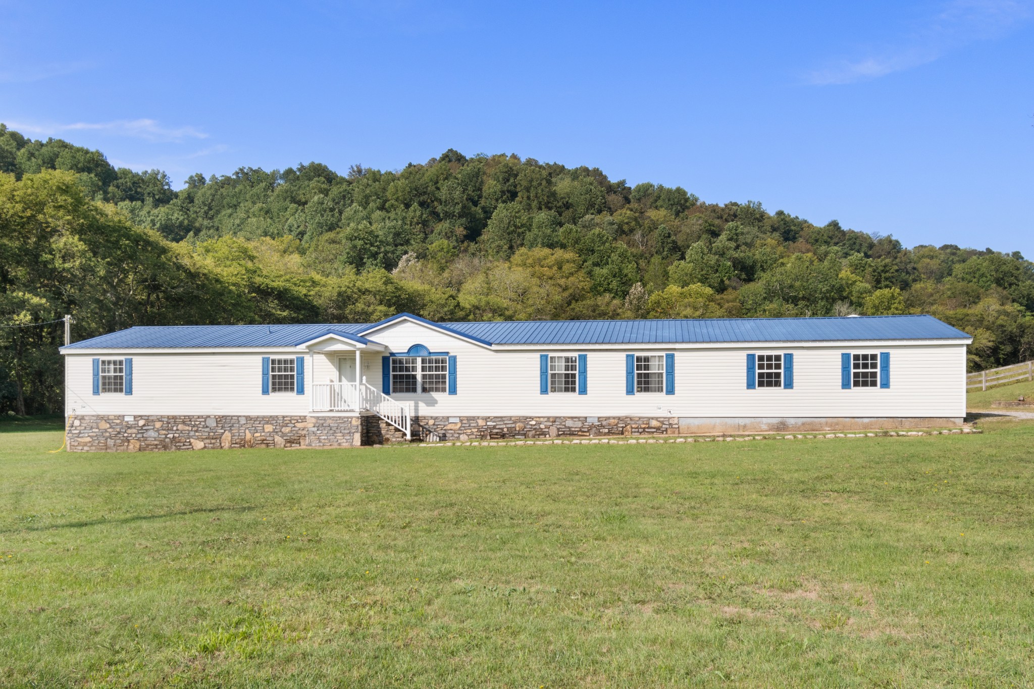 2600 Creecy Hollow Road Pulaski, TN 38478 - Photo 3 of 47 front view of a house with a yard
