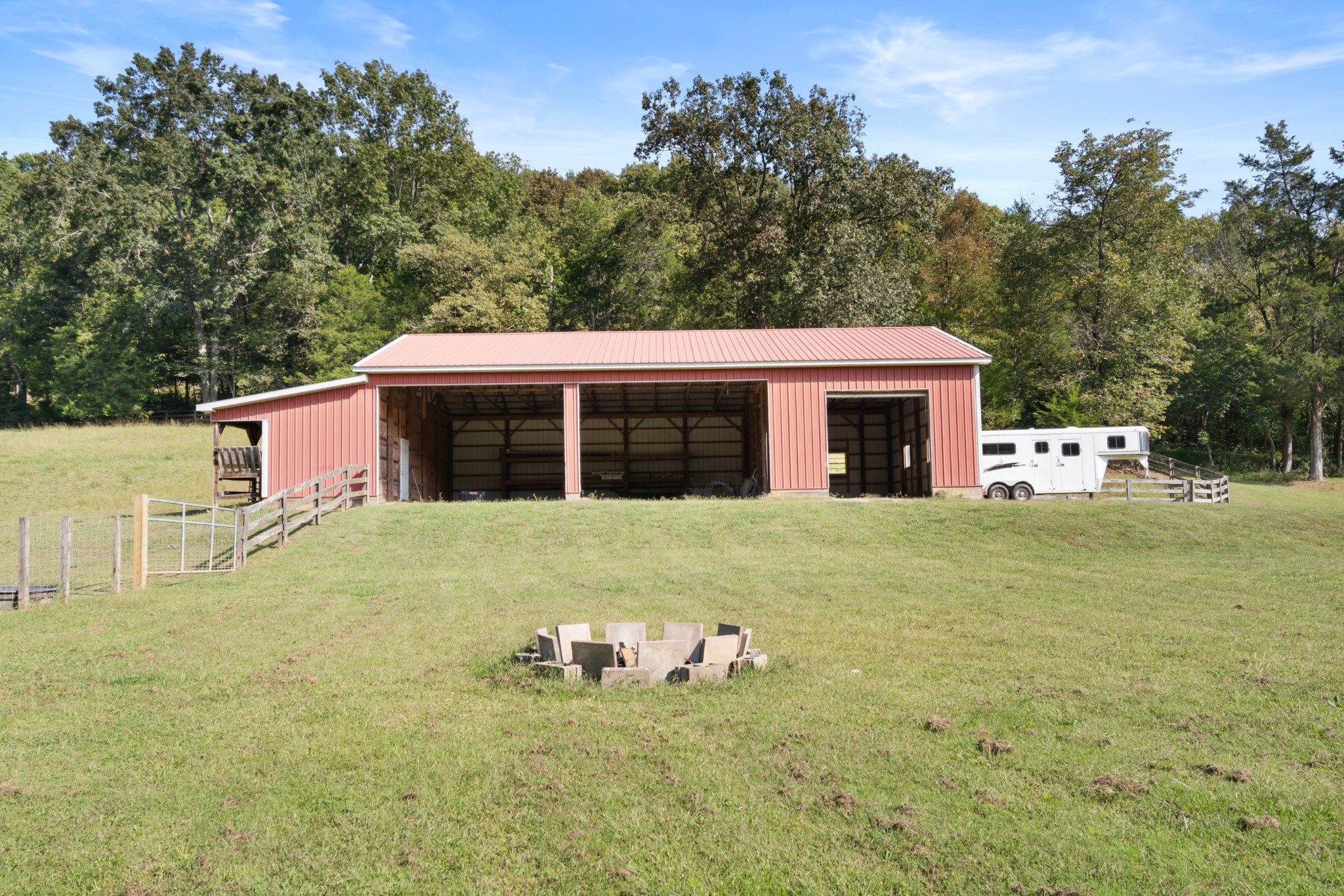 2600 Creecy Hollow Road Pulaski, TN 38478 - Photo 33 of 47 a front view of a house with a garden and yard